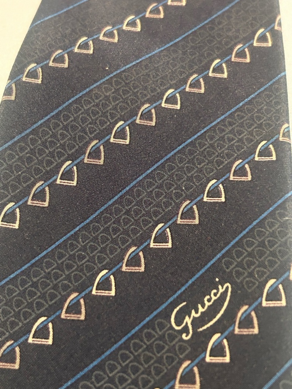 Gucci Black Tie with Blue Stripes and Gold Motif
